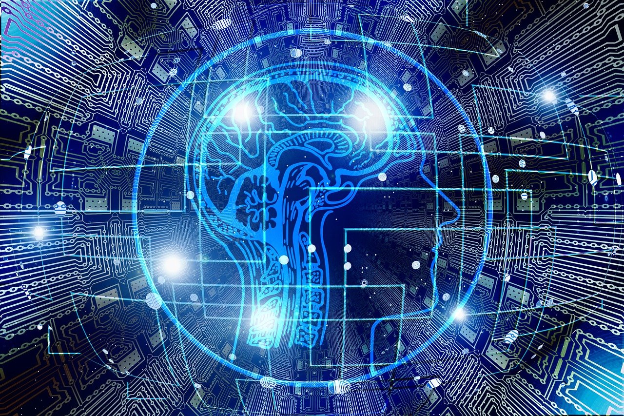 Blue outline of human brain against blue electric circuitboards