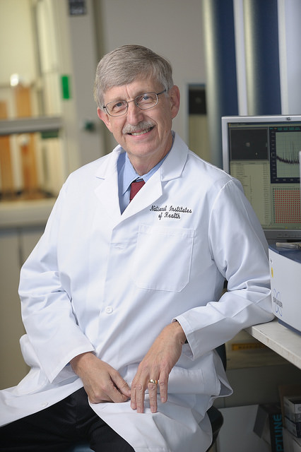 Francis COllins, director of the National Institutes of Health, is pictured sitting down in a white coat. 