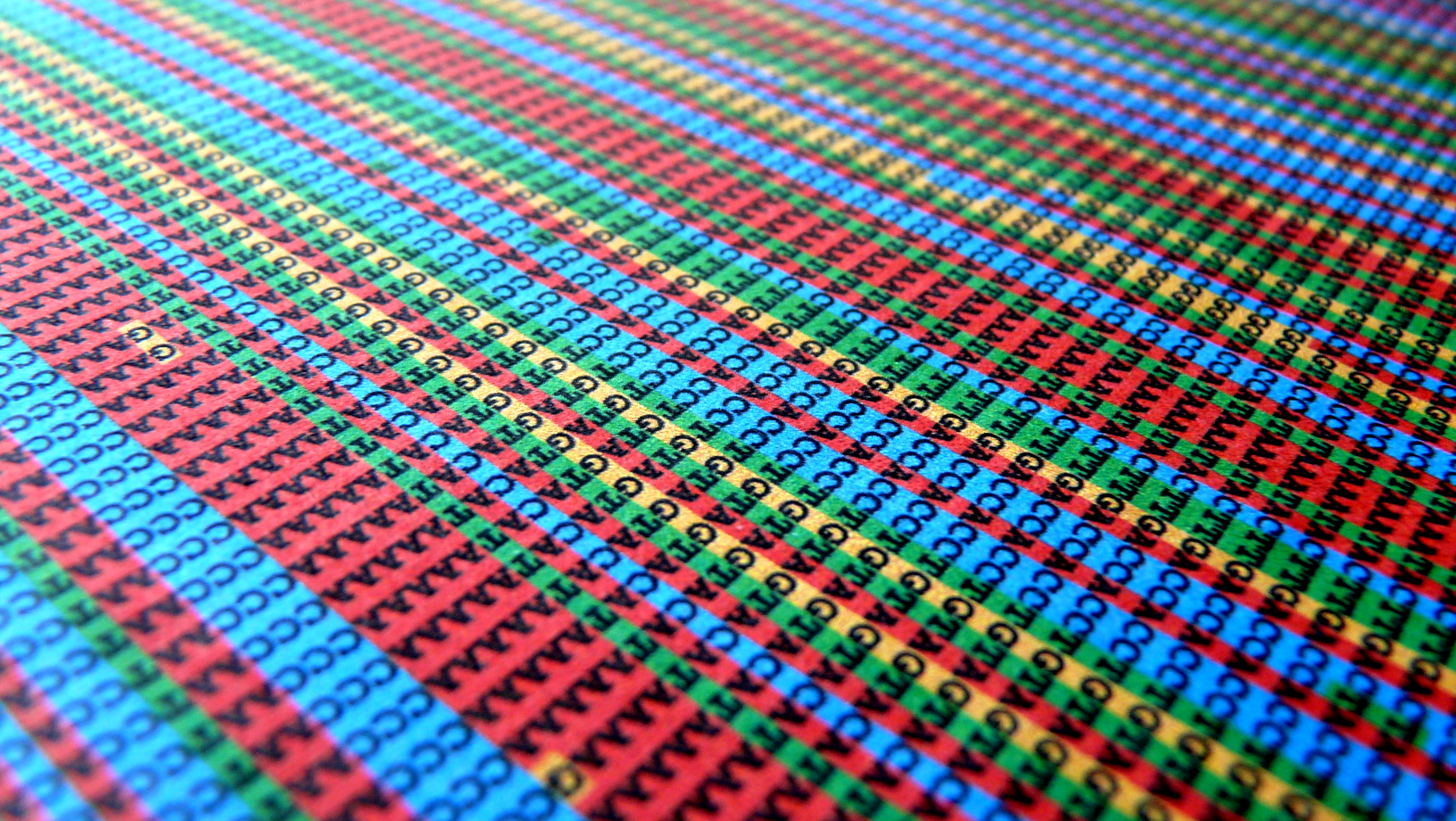 Repeating letters ATCG in a colorful chart that represents a DNA sequence.