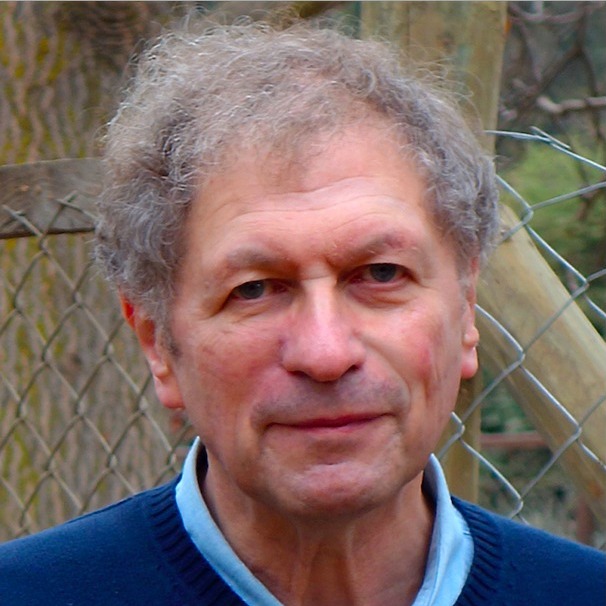 image of a white man with curly grey hair