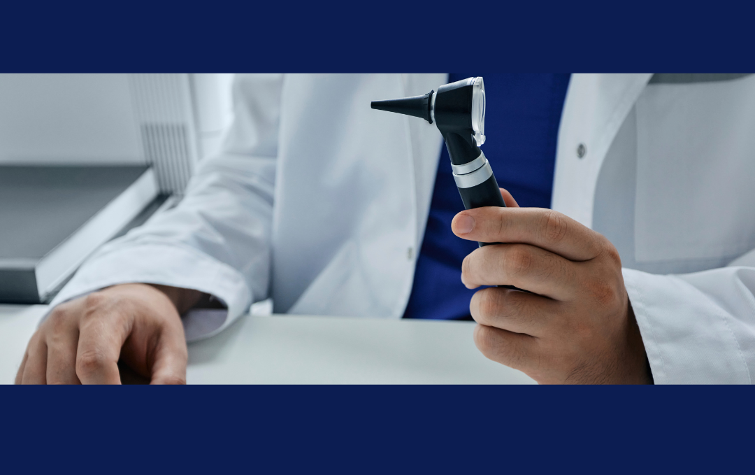 healthcare provider holding audiology tool on blue background