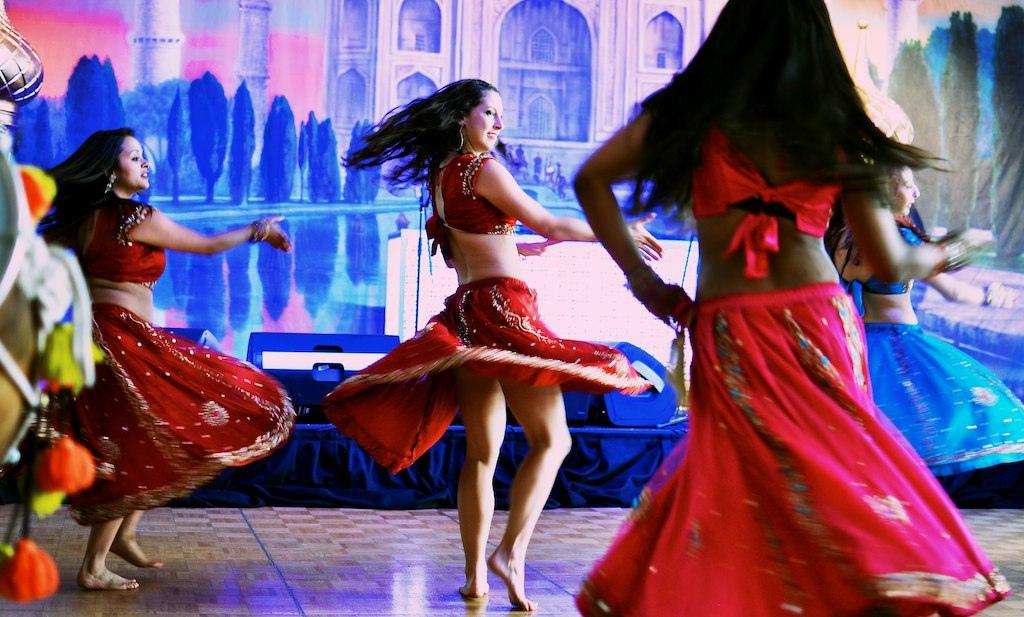 Three women dancing for Bollywood.