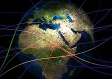 A translucent globe is surrounded by multiple lines between continents.