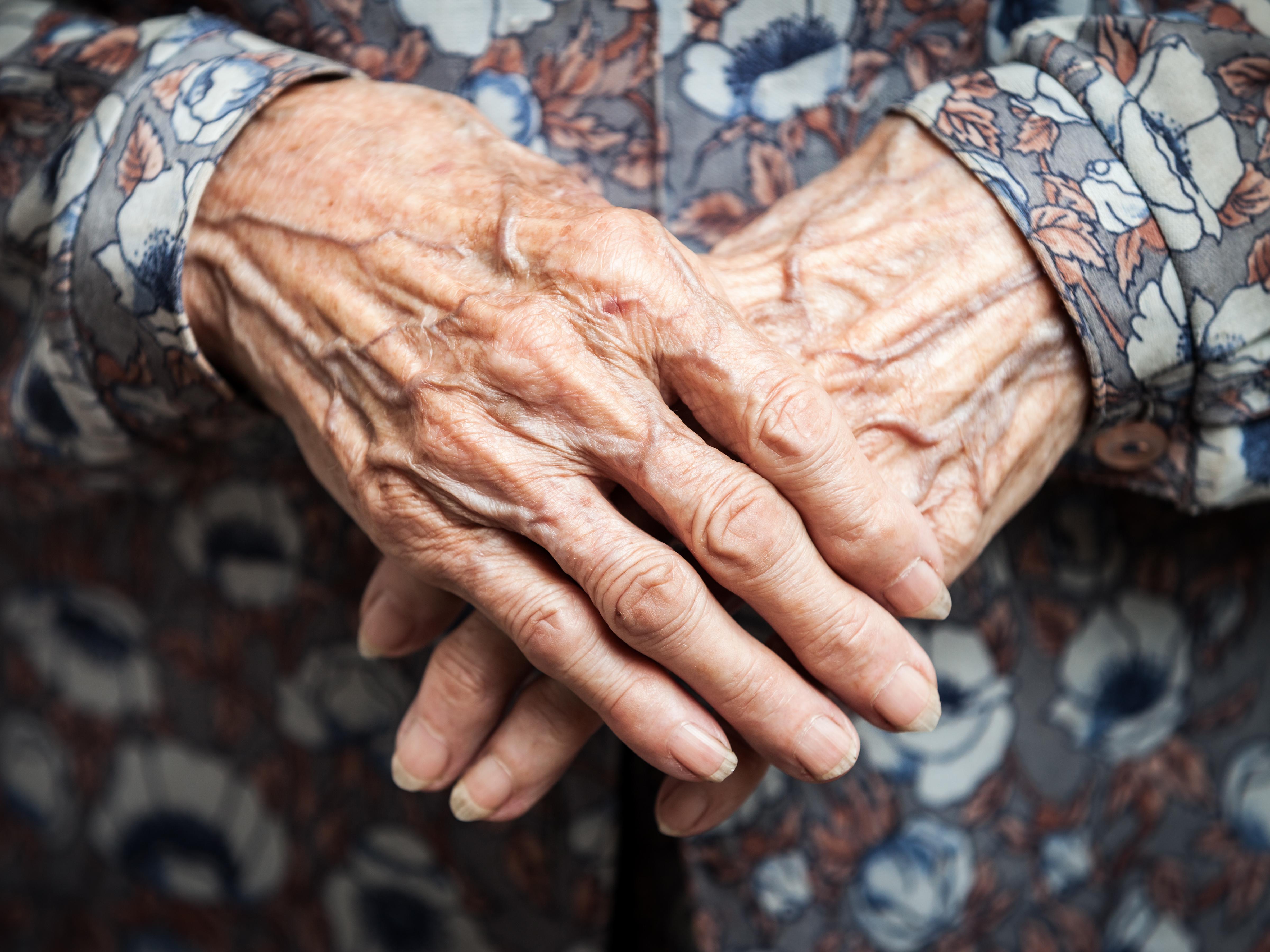 elderly white hands