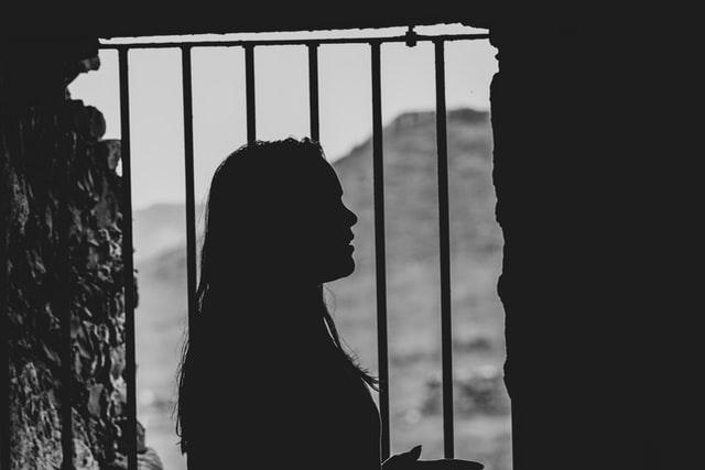 Woman behind bars